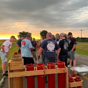 Members of the fireworks committee discuss the event before the display began on Saturday.